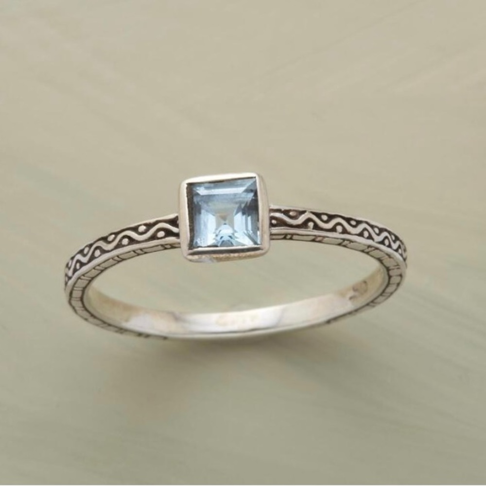 Sundance blue topaz ring “Wavewatcher” in sterling silver